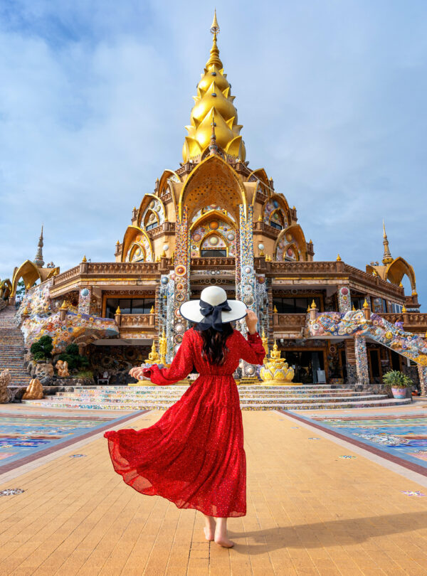 Woman standing at Wat Phra That Pha Son Kaew Temple in Khao Kho